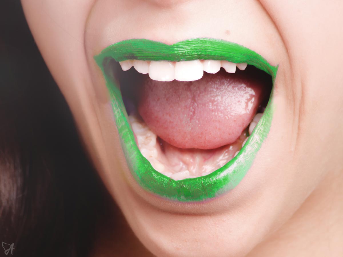 CBD Oil Under the Tongue Green Lips