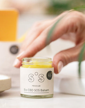 Organic CBD SOS balm – BioBloom (with hand)